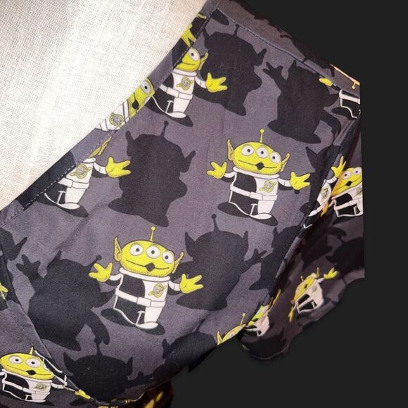 NWT Scrubstar Pixar Toy Story "Alien Madness" Print Women's Mock Wrap Scrub Top - Picture 2 of 5